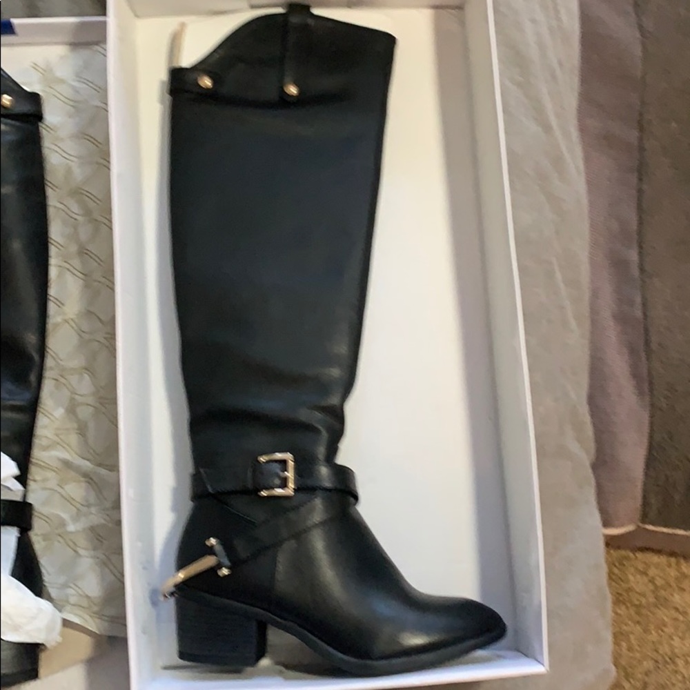 Black tall boots. Brand new.